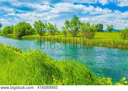 River Gacka In Lika Region Of Croatia, Nature Landscape, Cloudy Sky