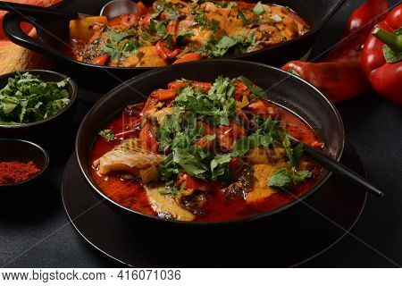 Moroccan Fish  With Chermoula, Red Peppers And Preserved Lemon. Spicy Traditional  Moroccan Food
