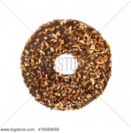 Donut With Frosted Chocolate Glaze And Nuts Sprinkles Isolated On White Background. One Round Chocol