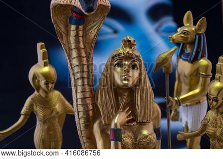 Still Life With Egyptian Figures Of Anubis Cleopatra With Snake And The Goddess Nebtht And Eset