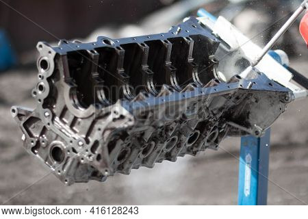 Washing The Engine Block. Disassembled Engine From The Car.