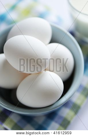 Eggs in a bowl with milk
