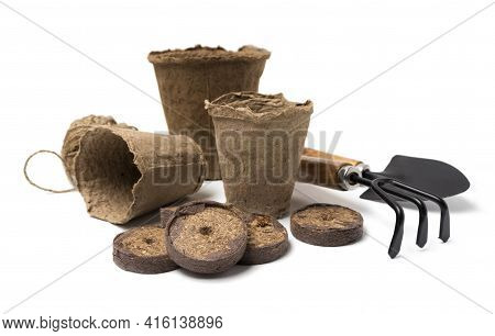 Biodegradable Peat Pots, Peat Tablets, Garden Tools And Rope Isolated On White Background. Spring Ga