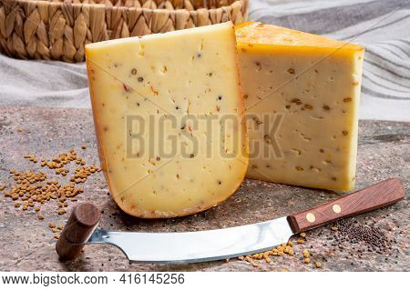 Cheese Collection, Pieces Of Hard Yellow Dutch Gouda Cheese With Dried Caraway, Mustard, Cumin, Fenu