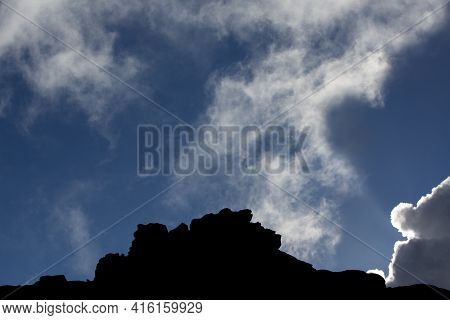 Silhouette Of Cliffs, Clouds And Blue Sky In Mount Roraima