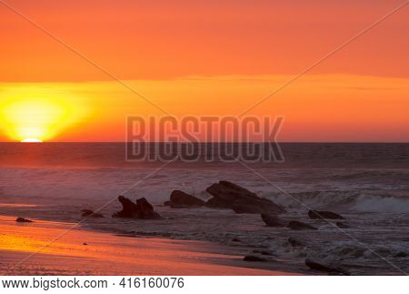 Ocean Sunset On The Beach And The Pacific Ocean In Punta Sal, Peru