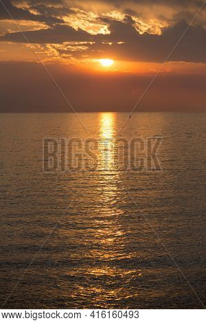 Fantastic Colored Sunset On The River Rio De La Plata. A Tapering Intrusion Of The Atlantic Ocean On