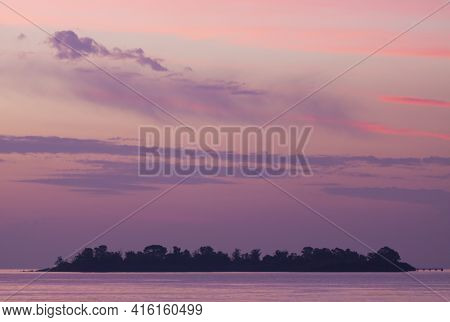 Fantastic Colored Sunset On The River Rio De La Plata. A Tapering Intrusion Of The Atlantic Ocean On