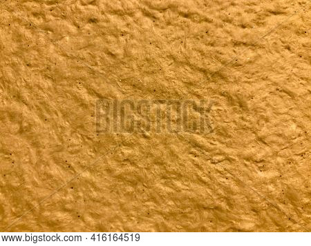 Texture Of Beige Color. Plaster Wall In Yellow Shades. Volumetric, Embossed Wall For Art Work. Unusu