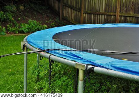 Dangerous Live Downed Power Line Draped Across Trampoline