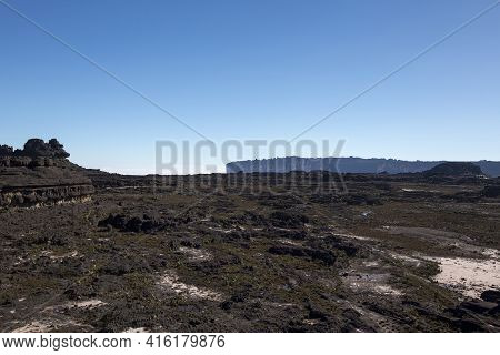 Clear Blue Sky And View On Roraima Tepuy, A Black Volcanic Moon Surface, Gran Sabana. Venezuela 2015