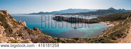 Panoramic View Of A Sailing Yacht Moored In A Bay On The Translucent Mediterranean Sea On The Coast 