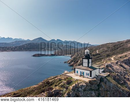Aerial View Of Revellata Lighthouse On A Rocky Outcrop Near Calvi In The Balagne Region Of Corsica W
