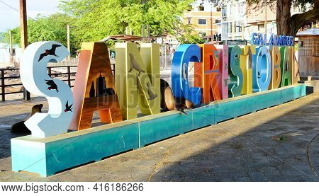 SAN CRISTOBAL ISLAND, GALAPAGOS - FEBRUARY 17, 2017: Colorful San Cristobal sign in Puerto Baquerizo the capital city of the Galapagos Archipelago.
