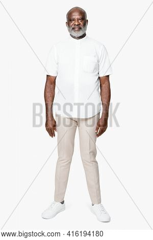 Man in collarless white shirt apparel shoot