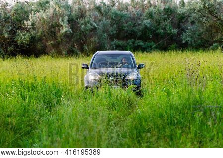 Russia, Rostovskaya Oblast - June 10, 2020: Suv Honda Crv 4x4, Black Colour In Wild Nature. Travel A