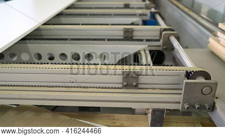 Production Line On Furniture Factory. Production Of Furniture Edging Detail. Plywood On A Machine In