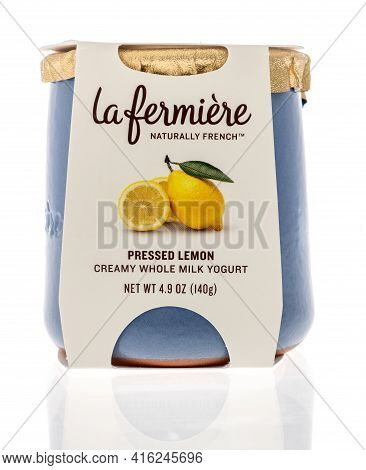 Winneconne, Wi - 7 April 2021:  A Package Of La Fermiere Creamy Whole Milk Yogurt On An Isolated Bac