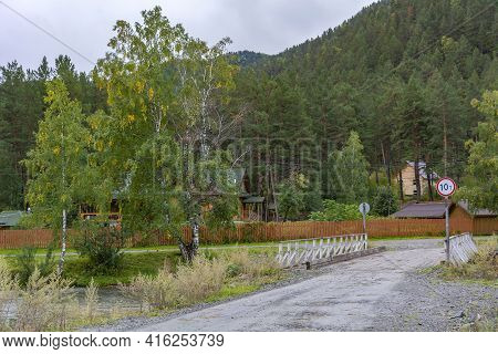 Gorny Altai, Automobile Bridge Over The Sema River In The Village Of Kamlak, Autumn