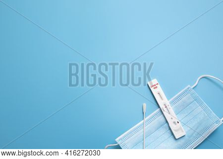 Rapid Coronavirus Test On The Blue Background. Negative Test Result By Using Rapid Test Device For C