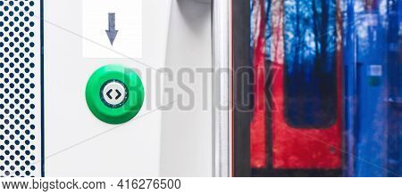 Button Opening The Door Of A Modern Electric Train Stadler, Close Up.