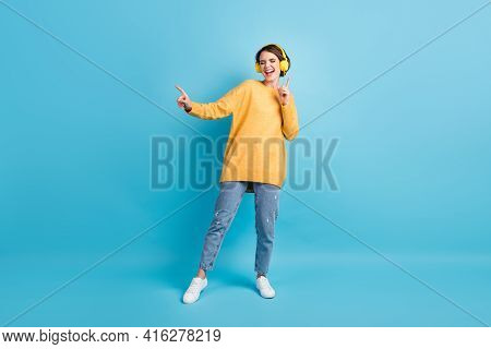 Full Length Body Size Photo Of Pretty Girl Listening To Music With Headphones Dancing Isolated On Vi