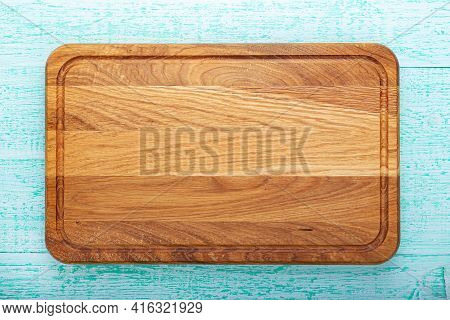 Multifunctional Wooden Chopping Board For Cutting Bread, Pizza Or Steak On Wood Background. Soace Fo