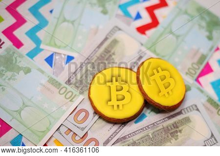 Sweets Lie On Denominations Of Dollars And Euros. The Economic Concept Shows The Instability Of Any 