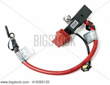 Automotive Wiring Harness With Positive Battery Terminal And Squib For Disconnection In Case Of An A