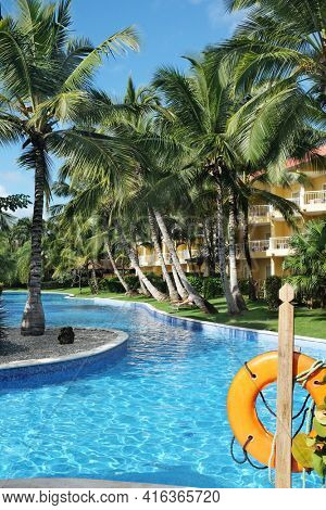 PUNTA CANA, DOMINICAN REPUBLIC - DEC 21, 2016:Pool area at Dreams Resort and Spa, Punta Cana in the Dominican Republic. The resort is one of several properties in the AMResorts Collection.