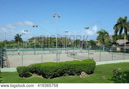 PUNTA CANA, DOMINICAN REPUBLIC - DEC 21, 2016:Tennis Courts at Dreams Punta Cana in the Dominican Republic. The resort is one of several properties in the AMResorts Collection.