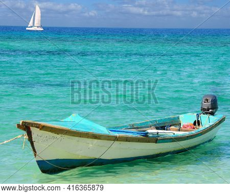 Fishing Boat and Sailboat in the Caribbean
