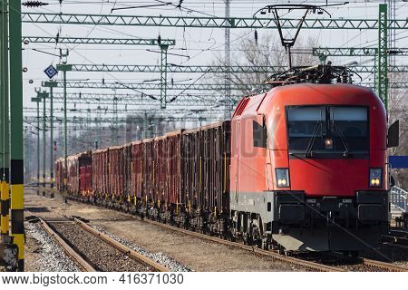 Untitled Cargo Train Locomotive At Railway Train Station. Platform Track View. International Freight