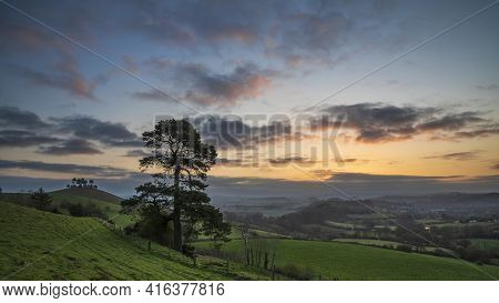 Stunning beautiful sunrise landscape image of Colmer\\\\\\\'s Hill in Dorset on a Spring morning