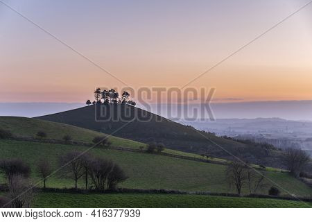 Stunning beautiful sunrise landscape image of Colmer\\\\\\\'s Hill in Dorset on a Spring morning