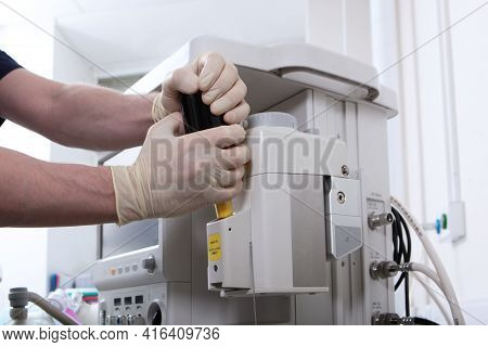 The Anesthesiologist Prepares The Equipment For The Operation Under General Anesthesia. Drug For Ane