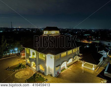 Aerial Drone View Of Monument Gedung Juang Is One Of Historical Building In Tambun At Night. Bekasi,