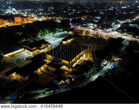 Aerial Drone View Of Monument Gedung Juang Is One Of Historical Building In Tambun At Night. Bekasi,