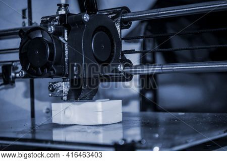 3d Printer Printing Black Shapes Close-up Automatic Three Dimensional 3d Printer