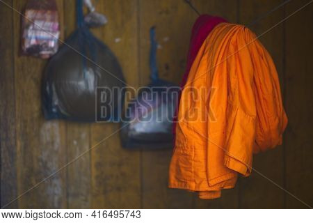 Orange Monk Dressing In Monastery Phongsali Laos
