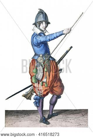A soldier, ten feet, to the right, holding a rudder (a particular type of firearm) with his left thigh with his left thigh and bringing his right hand to the end of his ramrod, vintage engraving.