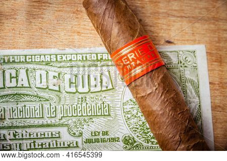 Paris - France - March 23, 2021 : Partagas Cuban Cigar On Vintage Wooden Box With Cuban Official Tax