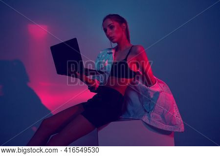 Nft Cryptoart Concept. Young Girl Create Project On Laptop For Sale At A Cryptocurrency Token Auctio