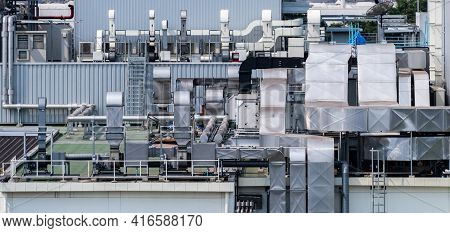Air Flow System Of Factory. Industrial Ventilation. Air Flow System On Roof Deck Of Manufacturing Bu