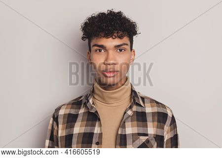 Photo Of African Guy Wavy Hairstyle Look Camera Wear Checkered Shirt Rollneck Isolated Grey Color Ba