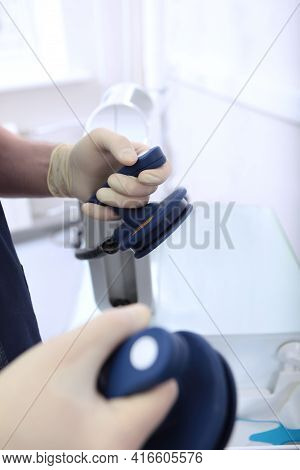Preparation For Defibrillation. Electrodes Are In The Hands Of The Anesthesiologist. Saving Lives. R