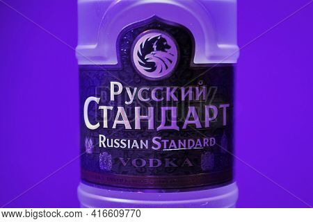 Budapest, Hungary - Circa 2021: Russian Standard Vodka in colorful flashing lights of a bar