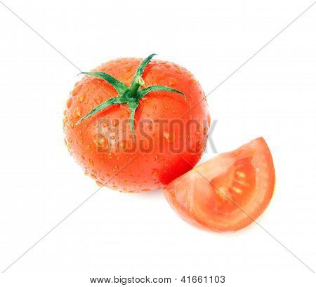 Fresh Tomato And Tomato Slice With Water Drops Isolated On White