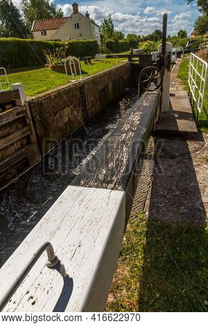 Picturesque Canal Lock In The Uk On Sunny Summer Day. Taunton And Bridgewater Canal, Maunsel Lock, U