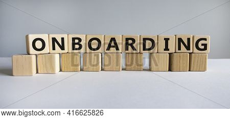 Onboarding Symbol. The Word 'onboarding' On Wooden Cubes. Business And Onboarding Concept. Beautiful